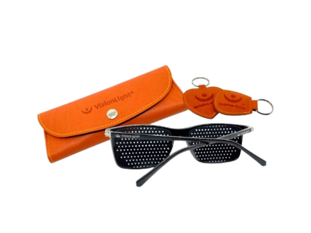 Occhiali forati stenopeici modello "venti" della Redefine Vision, colore nero con astuccio e portachiavi colore arancio