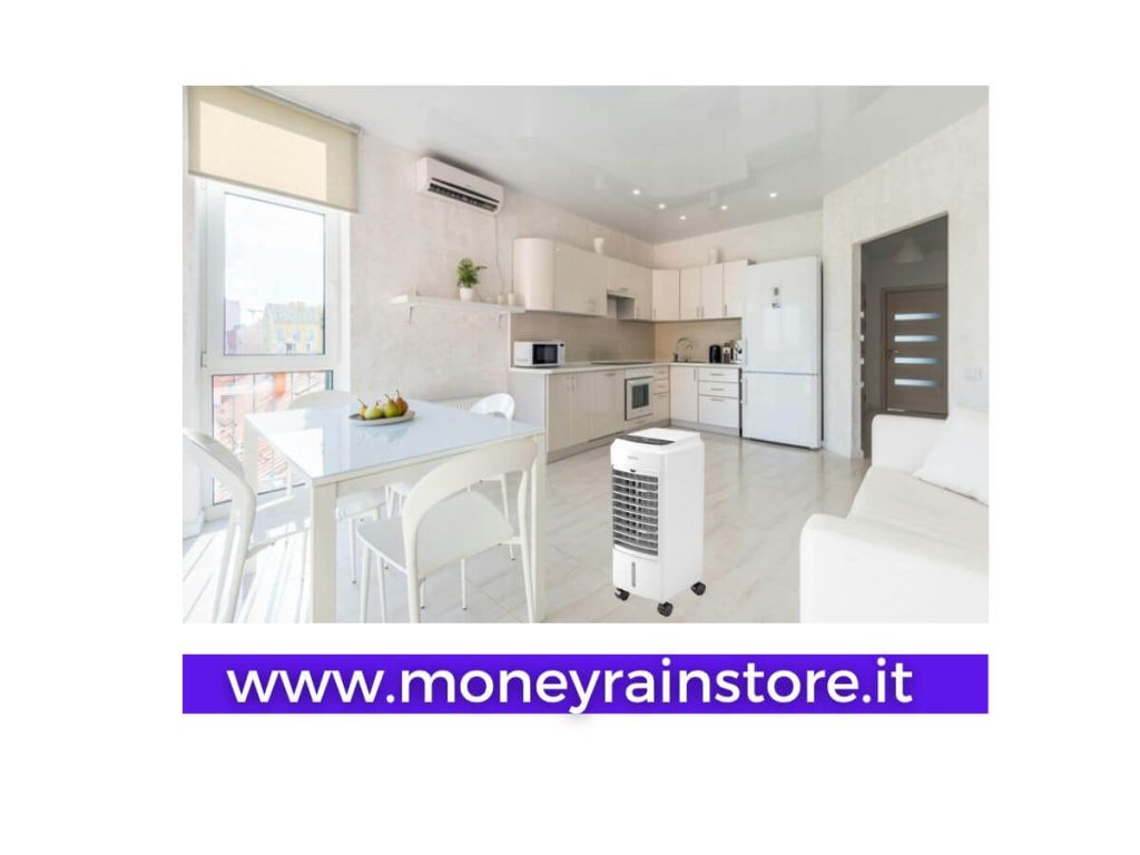Condizionatore elettrico a+++: la foto mostra una bellissima cucina colore bianco con tavolo e divano e al centro il condizionatore portatile elettrico a+++